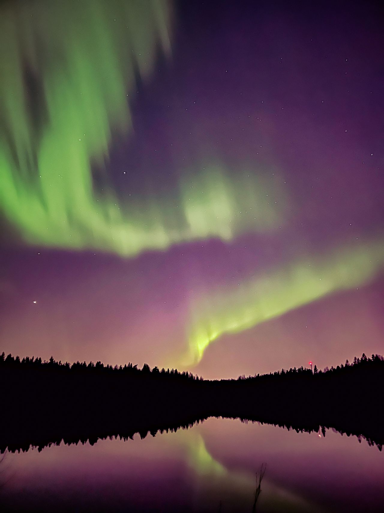 dancing ribbons of light fill the sky as the northern lights put on a show in Finland.