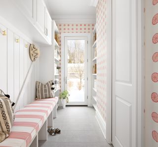 A mudroom fitted with soft furnishings