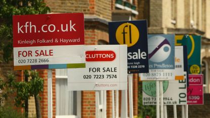 Property for sale signs in London, England