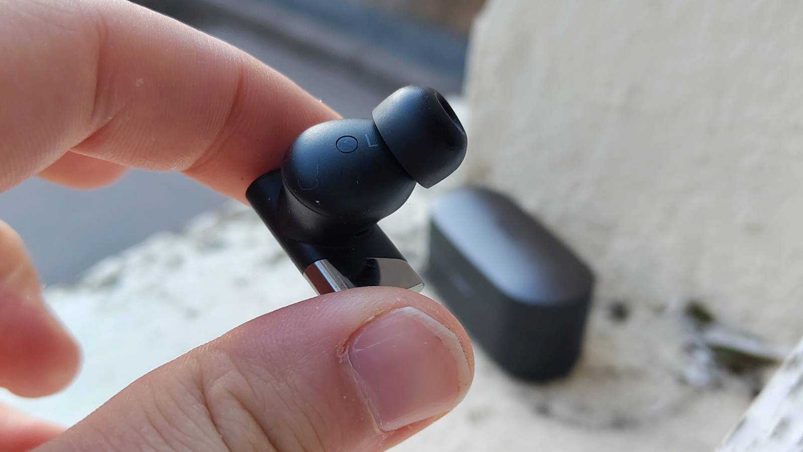 The Status Audio Pro X on a window sill.