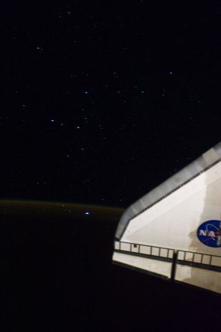 This is a view of the night sky of the Southern Hemisphere just off the port wing of NASA's shuttle Endeavour as the shuttle/space station tandem track northeastward over the South Atlantic Ocean about 1,400 miles southeast of Rio de Janeiro, Brazil. The