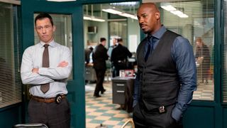Jeffrey Donovan as Det. Frank Cosgrove and Mehcad Brooks as Det. Jalen Shaw in the squad room in Law & Order season 22