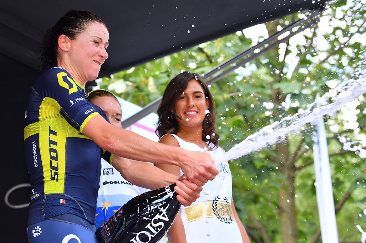 Annemiek van Vleuten pops the bubbly after her Giro Rosa stage win.