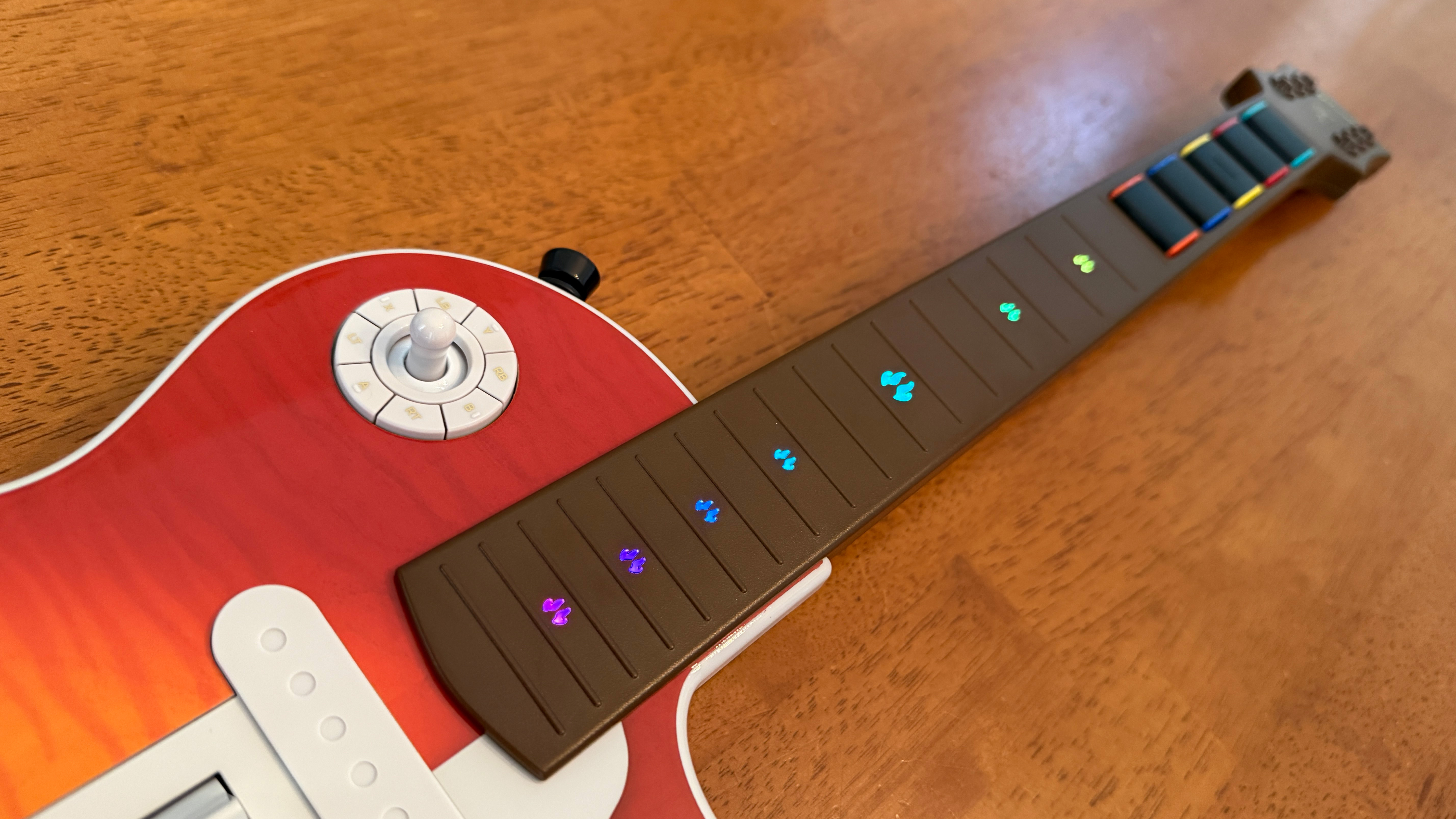 The RGB lighting on the OG Fret Neck of the CRKD Gibson Les Paul Pro Edition Guitar