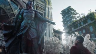 Benedict Cumberbatch looks up at Earth-838's Strange Statue in Doctor Strange in the Multiverse of Madness.