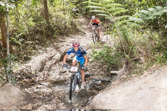 Greg Saw and Ramses Bekkenk on the chase after the bull attack in the thick rainforests of the Herberton Range Stage Forest on the Atherton Tablelands