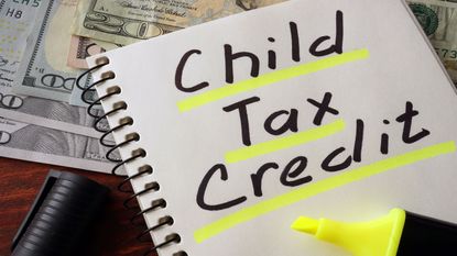 picture of a notebook with "child tax credit" written on a page