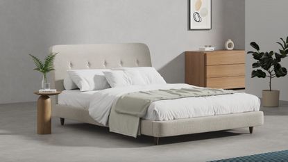 A grey upholstered bed frame from Simba