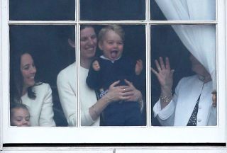 Prince George nanny Maria LONDON, ENGLAND - JUNE 13: Prince George of Cambridge is held by his nanny Maria Teresa Turrion Borrallo as he waves from the window of Buckingham Palace as he watches the Trooping The Colour ceremony on June 13, 2015 in London, England. The ceremony is Queen Elizabeth II's annual birthday parade and dates back to the time of Charles II in the 17th Century, when the Colours of a regiment were used as a rallying point in battle. (Photo by Chris Jackson/Getty Images)