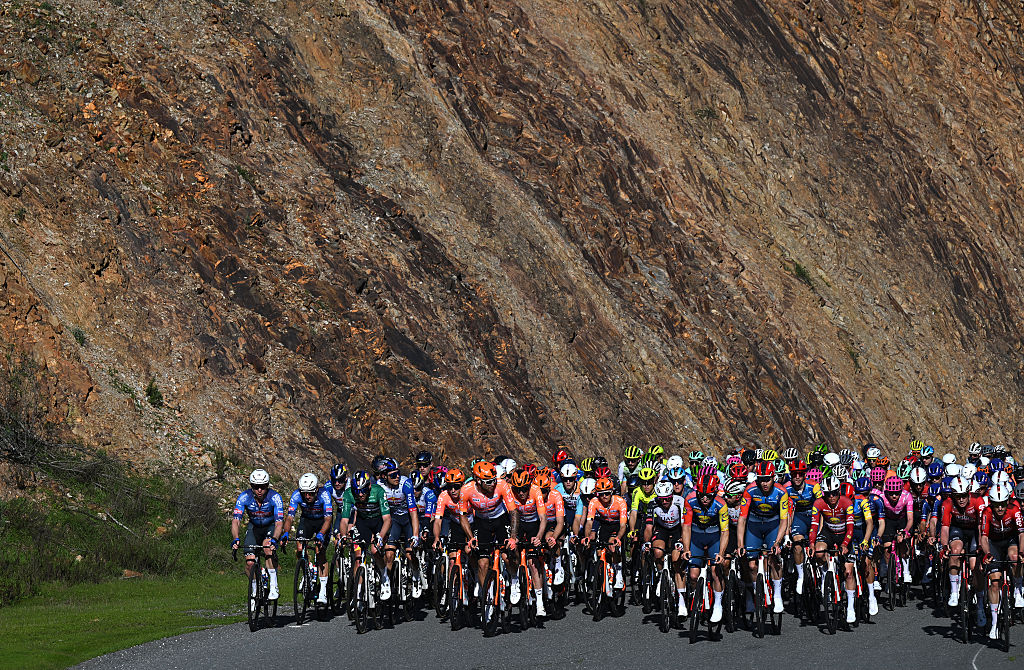 FOIA, PORTUGAL - FEBRUARY 19: A general view of the peloton competing during the 52nd Volta ao Algarve em Bicicleta 2026, Stage 2 a 183.5km stage from Portimao to Foia (Monchique) 882m on February 19, 2026 in Foia, Portugal. (Photo by Dario Belingheri/Getty Images)
