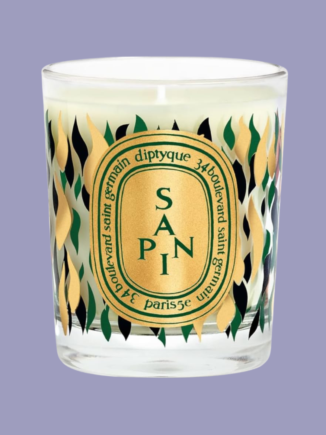 A Christmas tree scented candle from Diptyque