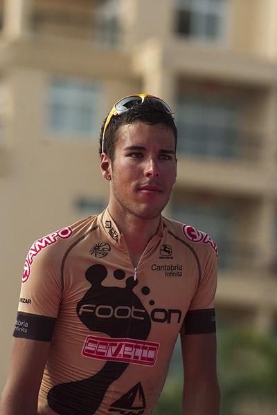 Arkaitz Duran (Footon Servetto) steps onto the podium in Sanya as the winner of the King of the Mountains competition.