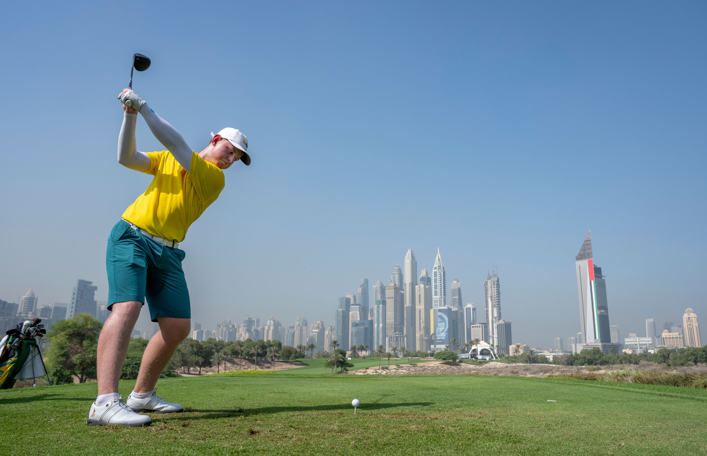An Australian player tees off towards Dubai