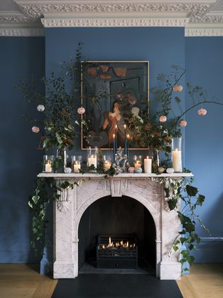 Blue living room with festive fireplace