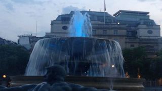 Trafalgar Square lights up with news of the royal baby