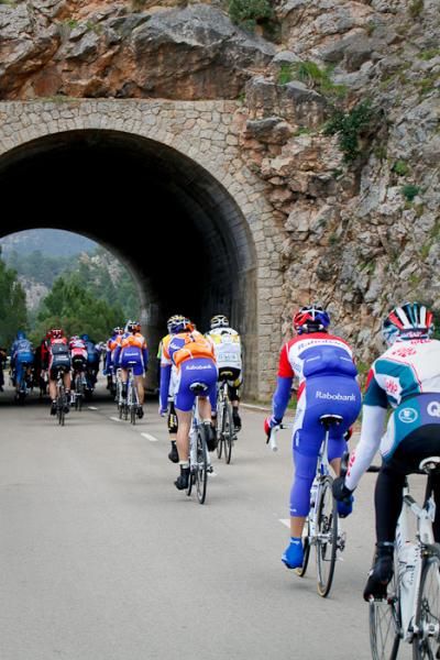 The riders at the back of the bunch suffering to stay together.