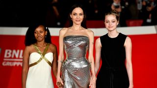 American actress Angelina Jolie (Versace dress) with daughters Zahara Marley Jolie-Pitt and Shiloh Jolie-Pitt at Rome Film Fest 2021. Eternals Red Carpet. Rome (Italy), October 24th, 2021