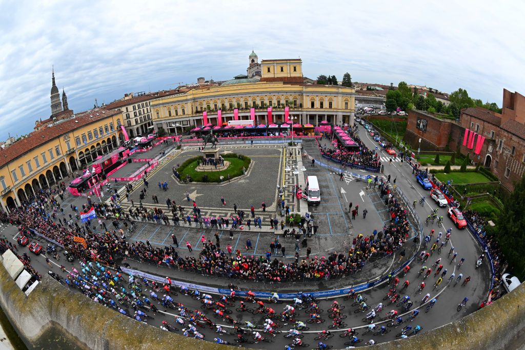 NOVARA ITALY MAY 06 A general view of the peloton competing in Piazza Martiri Della Libertaof Novara prior to the 107th Giro dItalia 2024 Stage 3 a 166km stage from Novara to Fossano 374m UCIWT on May 06 2024 in Novara Italy Photo by Tim de WaeleGetty Images