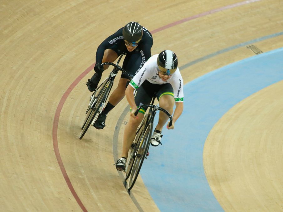 Natasha Hansen of New Zealand (L) competes with Kaarle Mcculloch