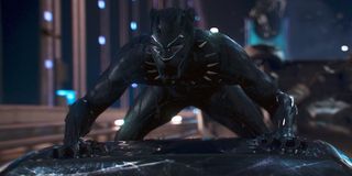 Black Panther T'Challa riding on the car roof