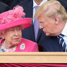 Queen Elizabeth II (L) reacts as she sits with US President Donald Trump an event to commemorate the 75th anniversary of the D-Day landings, in Portsmouth, southern England, on June 5, 2019