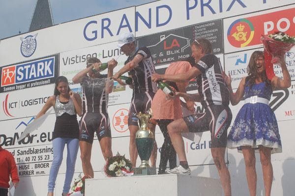 The podium celebrations begin between the three teammates. Photo &copy;: Kenneth M&oslash;ller Kristensen/www.CyclingWorld.dk