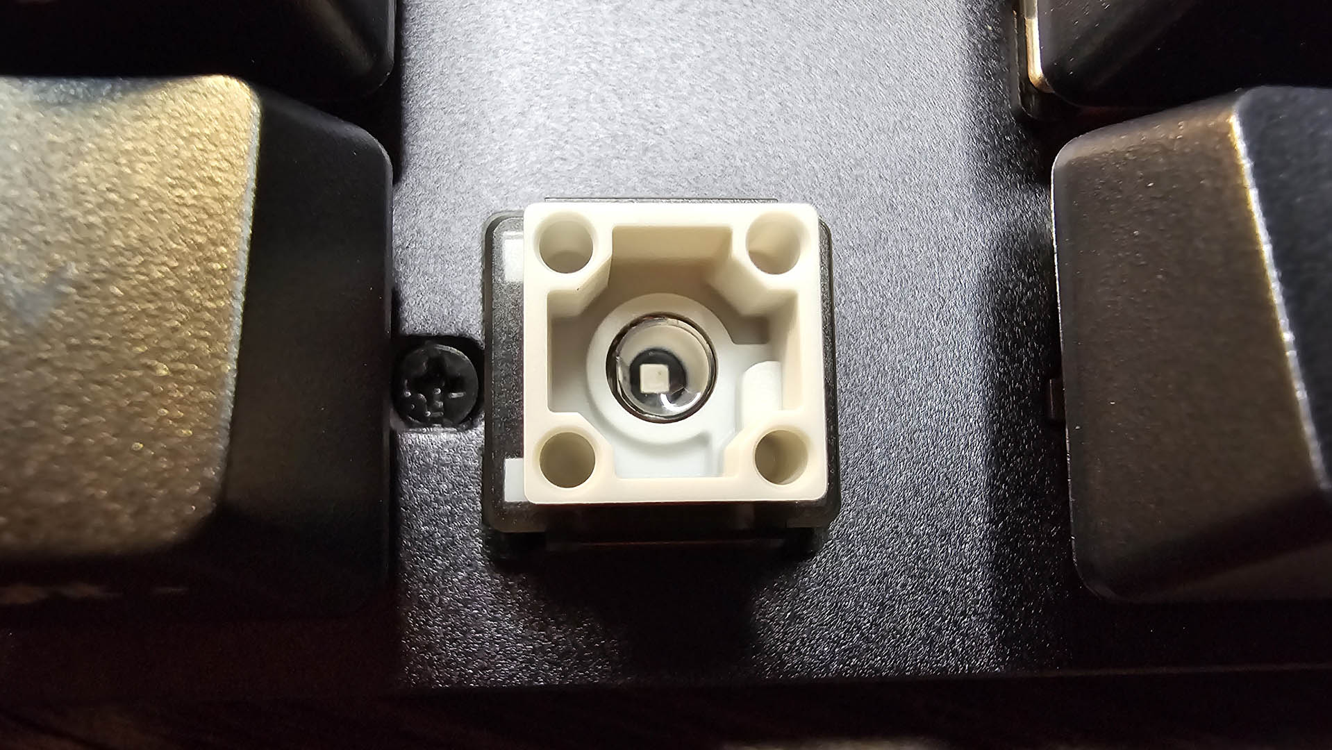 Shots of the Asus ROG Strix Scope II RX gaming keyboard in use