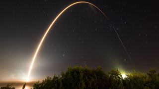 SpaceX launching a rocket with Starlink satellites