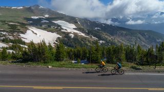 Tommy Caldwell and Alex Honnold riding through Rocky Mountain National Park in Colorado at the start of their expedition.