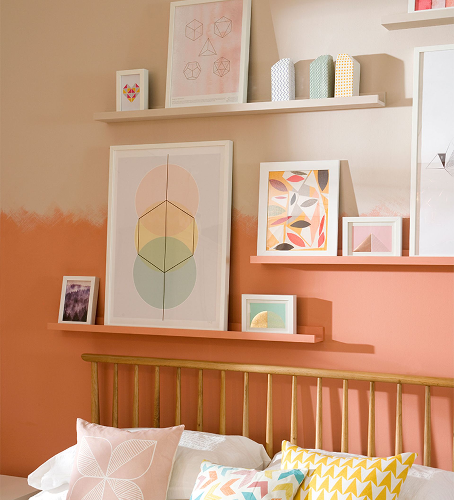 Teenage bedroom ideas with bed and picture ledges and wall art
