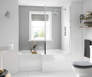 L-shaped shower bath in small bathroom