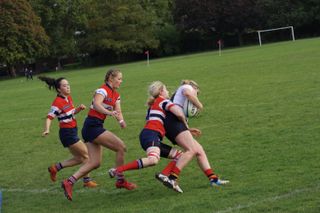 Victoria Rush is tackled!
