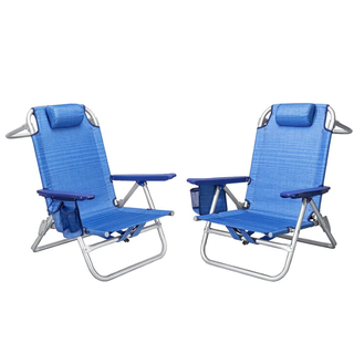 a pair of two beach or lawn chairs