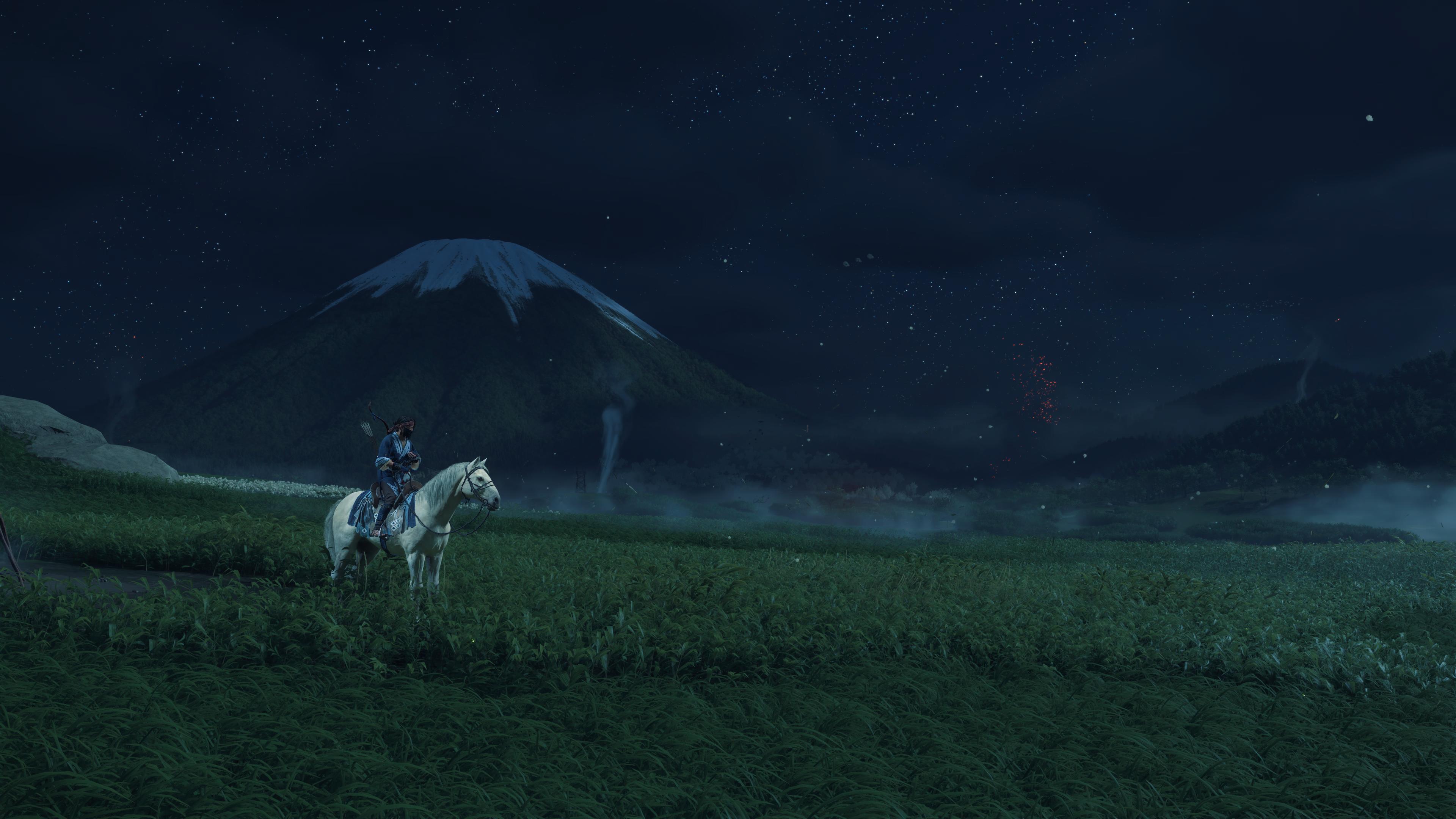 Atsu riding her horse in Ghost of Yotei with the black bars disabled