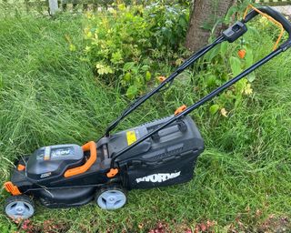 Worx WG779E.2 40V Cordless Lawn Mower on long grass
