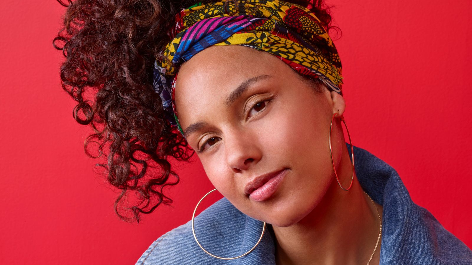 alicia keys on a red background