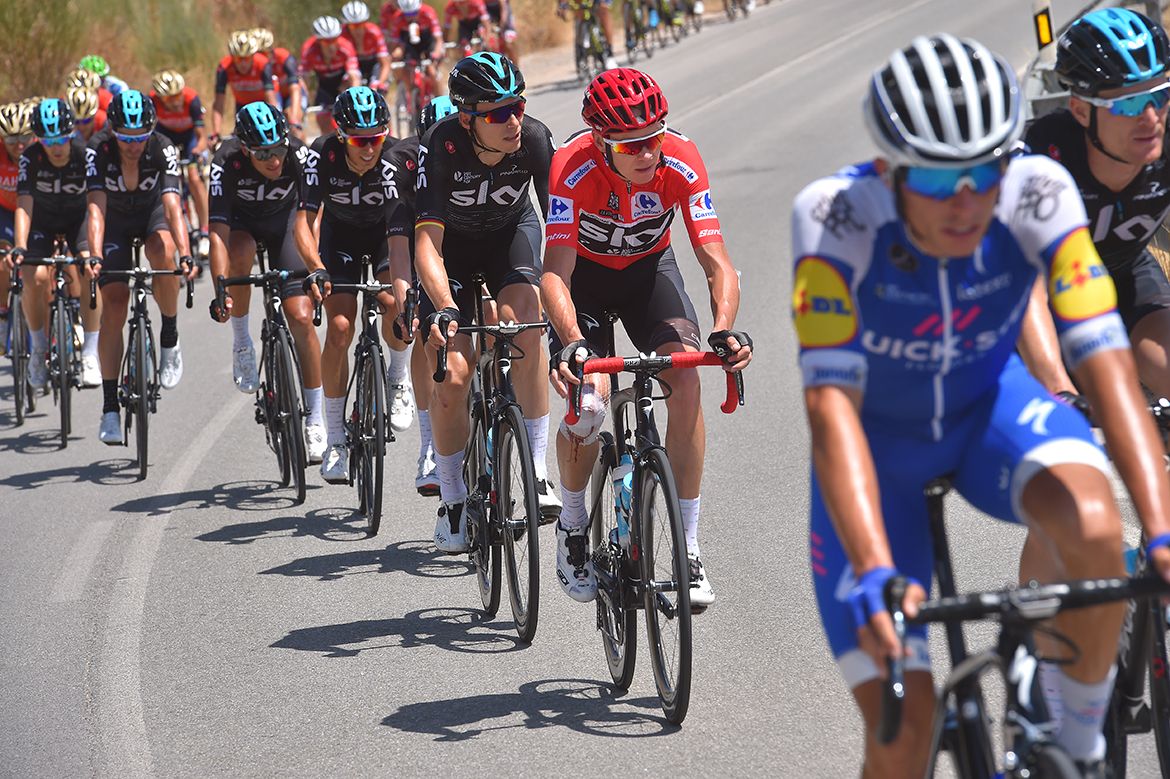 Chris Froome sits in the peloton
