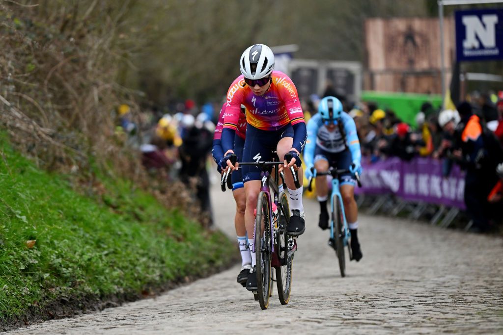 OUDENAARDE BELGIUM APRIL 02 Lotte Kopecky of Belgium and Team SD Worx competes passing through a Koppenberg cobblestones sector during the 20th Ronde van Vlaanderen Tour des Flandres 2023 Womens Elite a 1566km one day race from Oudenaarde to Oudenaarde UCIWWT on April 02 2023 in Oudenaarde Belgium Photo by Luc ClaessenGetty Images