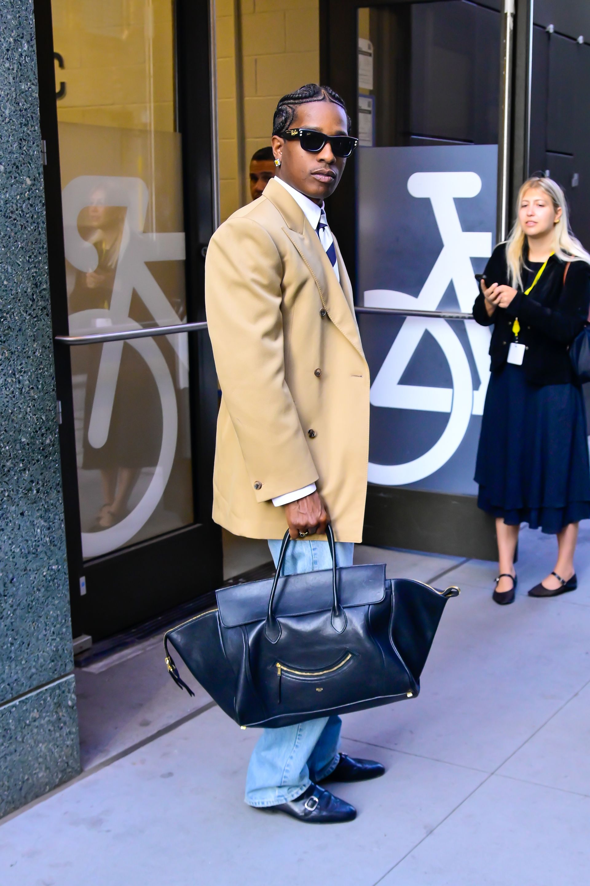 Asap Rocky carrying a Celine Luggage bag.