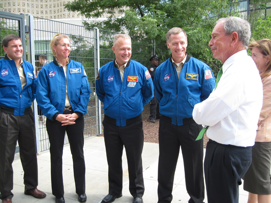 New York City Mayor Michael Bloomberg, right, greeted the STS-135 astronauts at the New York Hall of Science Aug. 17, 2011.