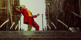 The Joker dancing on the stairs