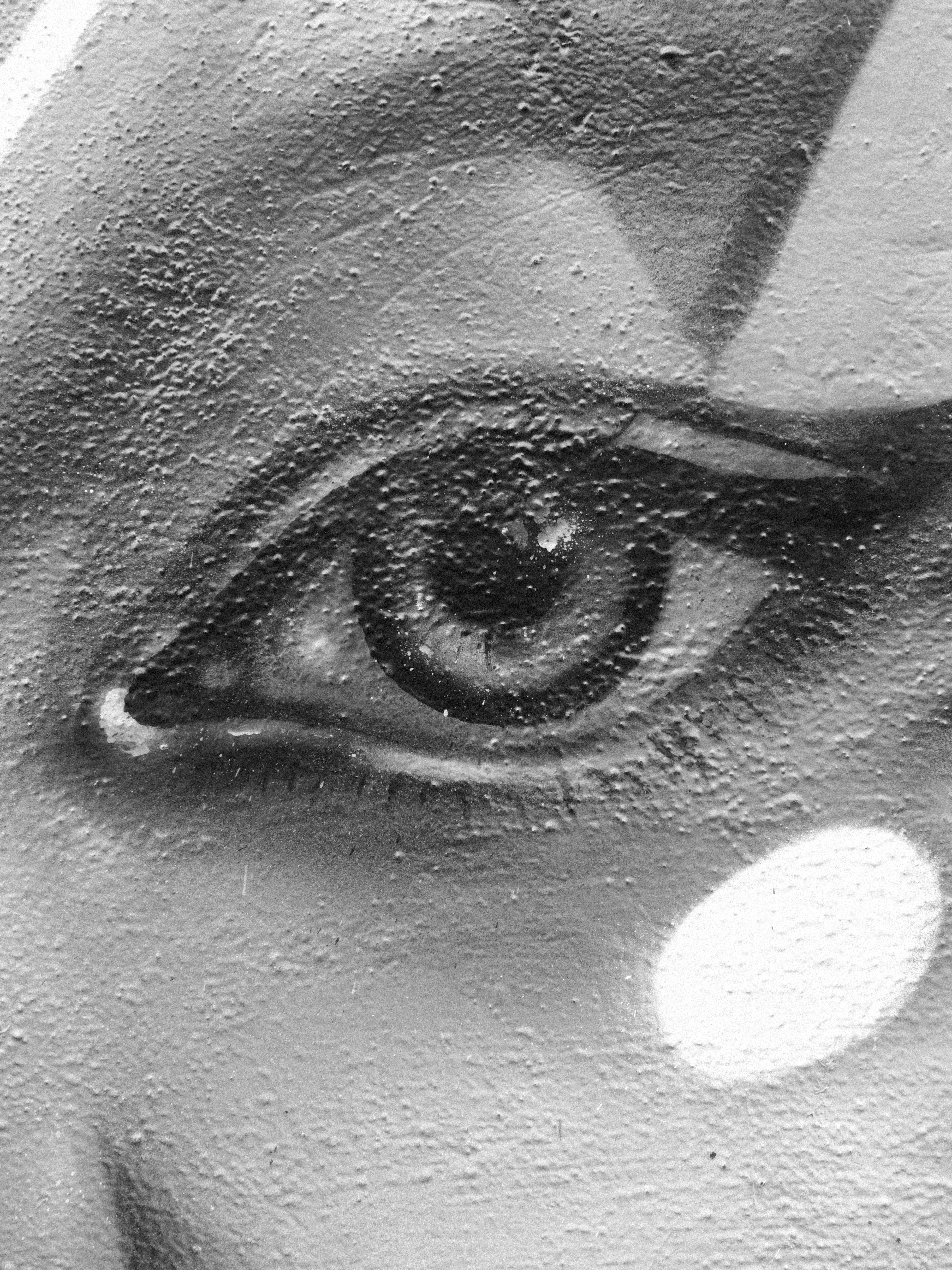Close up graffiti painting of an eye