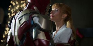 Gwyneth Paltrow's Pepper Potts in Iron Man's arms in Iron Man 3