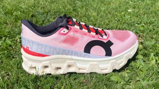 the On Cloudmonster Hyper in the Red/Cream colorway