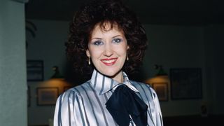 Anita Dobson as Angie Watts