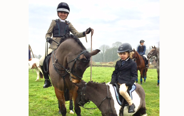 Neha Walker, aged 12, on Ledgend with her friend Phoenix Hodge, aged three, on Tina out with the Mendip Farmers