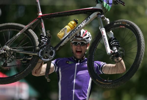 Uwe Hochenwarter celebrates winning the Alpentour Trophy title.