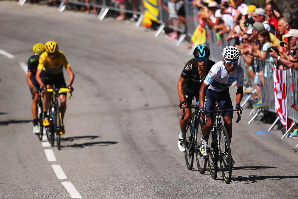 Nairo Quintana jumps way from Chris Froome on Alpe d'Huez and is marked by Richie Porte.