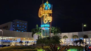 The Cabana Bay Beach Resort, lit up at night.