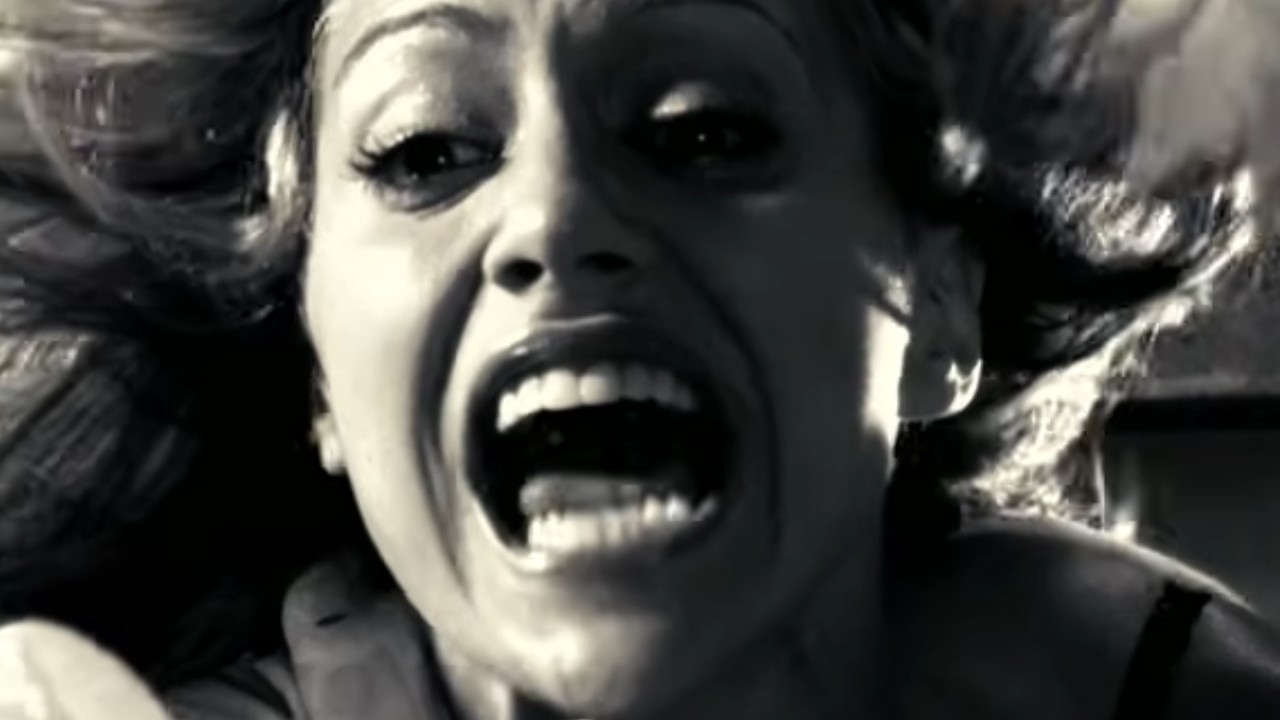 A screaming Brittany Murphy in Sin City